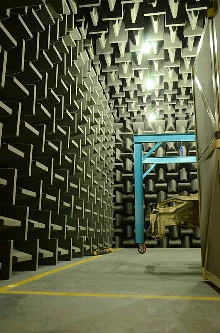 Semi-anechoic chamber with acoustic wedges on the walls and ceiling and a solid floor