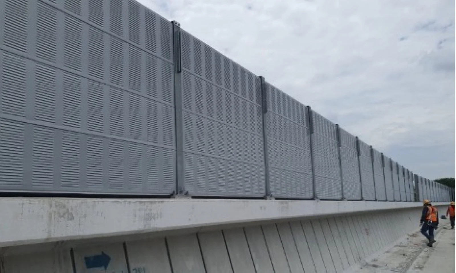 Close view of grey acoustic noise barrier panels for LRT3